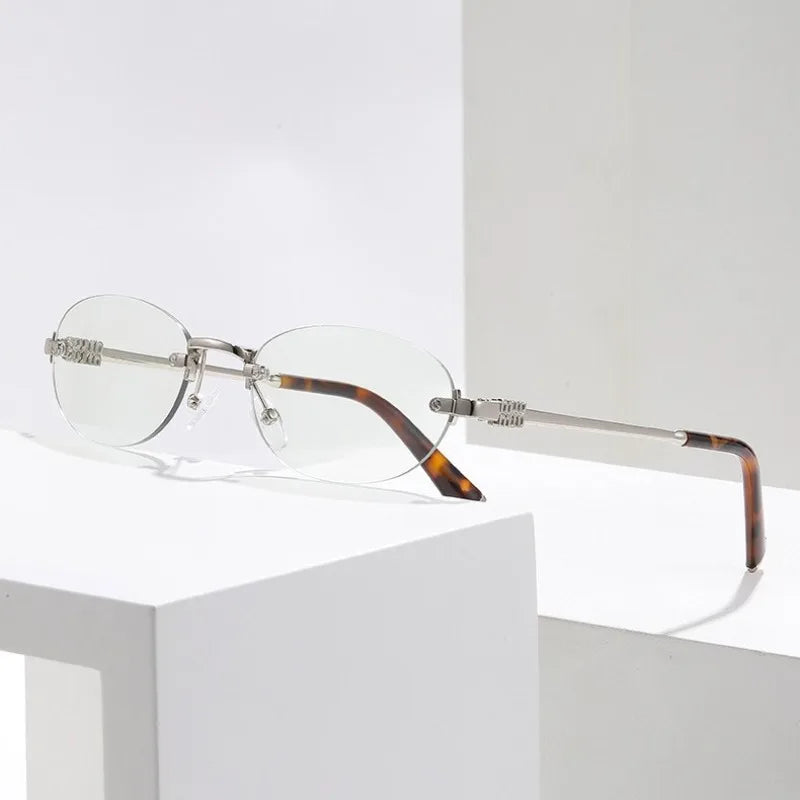 Fashion Women Rimless Photochromic Sunglasses Oval Metal Frame Transition Lens UV400 Protective Elegant Eyewear