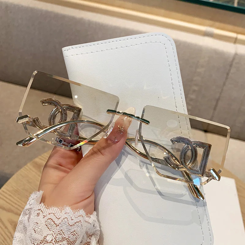 Luxury Rimless Brand Fashion Sunglasses For Women And Men Stylish Square Metal Sun Glasses Glamour Designer Shades UV400
