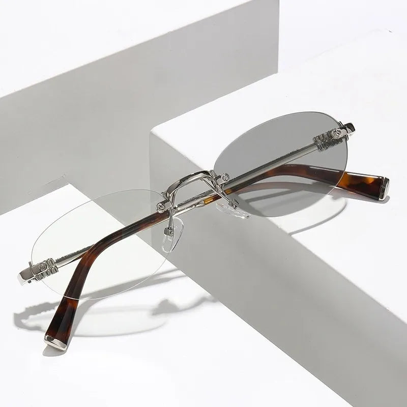 Fashion Women Rimless Photochromic Sunglasses Oval Metal Frame Transition Lens UV400 Protective Elegant Eyewear