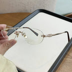 Fashion Women Rimless Photochromic Sunglasses Oval Metal Frame Transition Lens UV400 Protective Elegant Eyewear