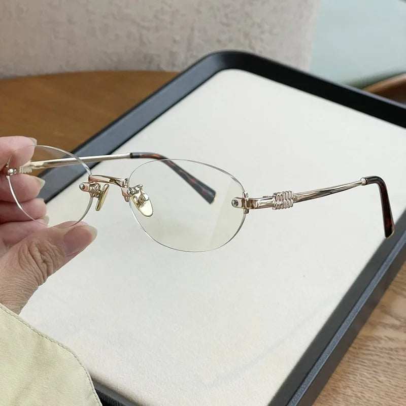 Fashion Women Rimless Photochromic Sunglasses Oval Metal Frame Transition Lens UV400 Protective Elegant Eyewear