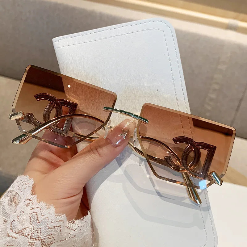 Luxury Rimless Brand Fashion Sunglasses For Women And Men Stylish Square Metal Sun Glasses Glamour Designer Shades UV400