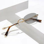 Fashion Women Rimless Photochromic Sunglasses Oval Metal Frame Transition Lens UV400 Protective Elegant Eyewear